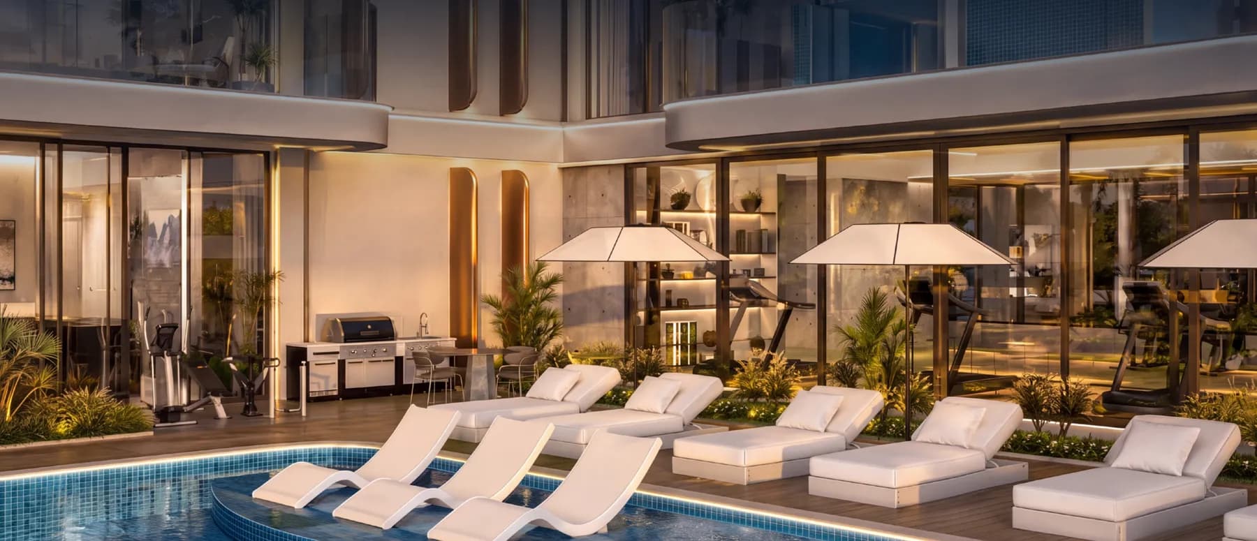 The pool deck and BBQ terrace at Samana Portside in the evening